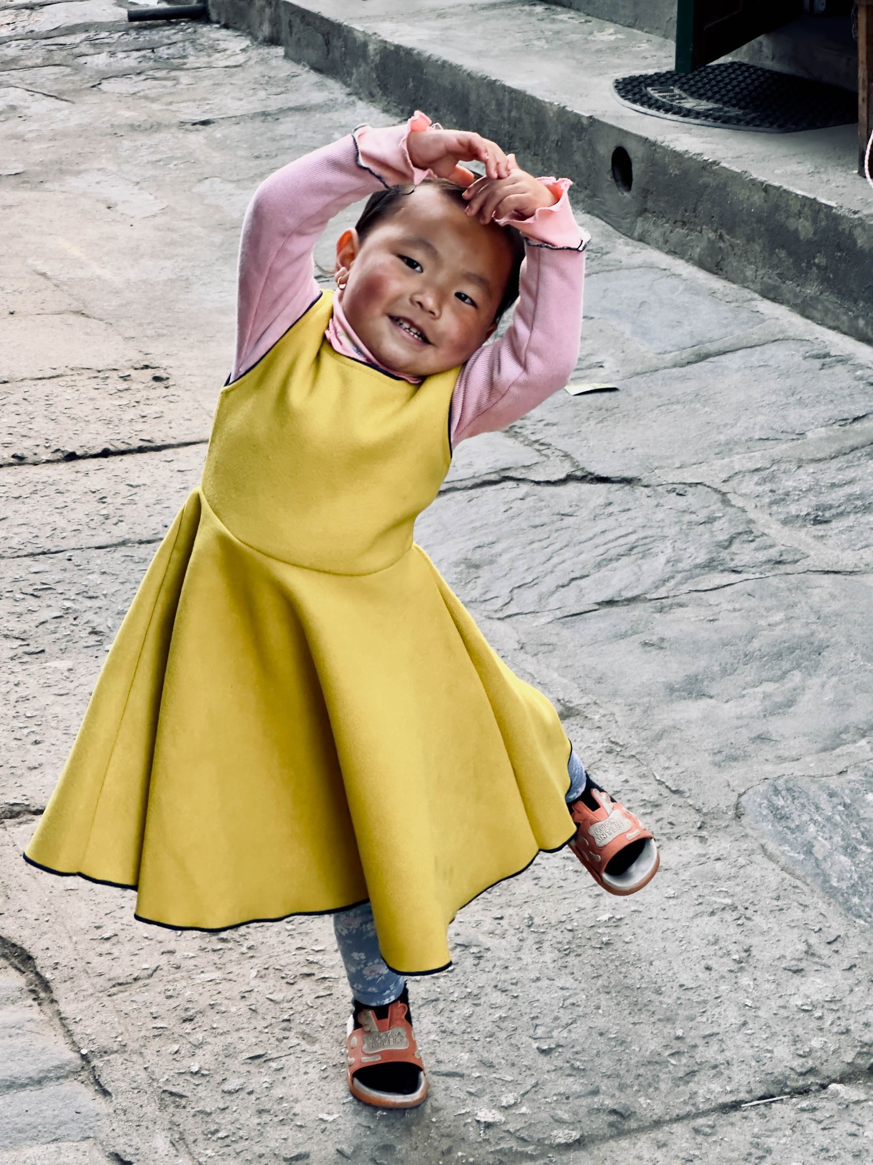 Little Girl in Yellow Dress Dances for Tihar